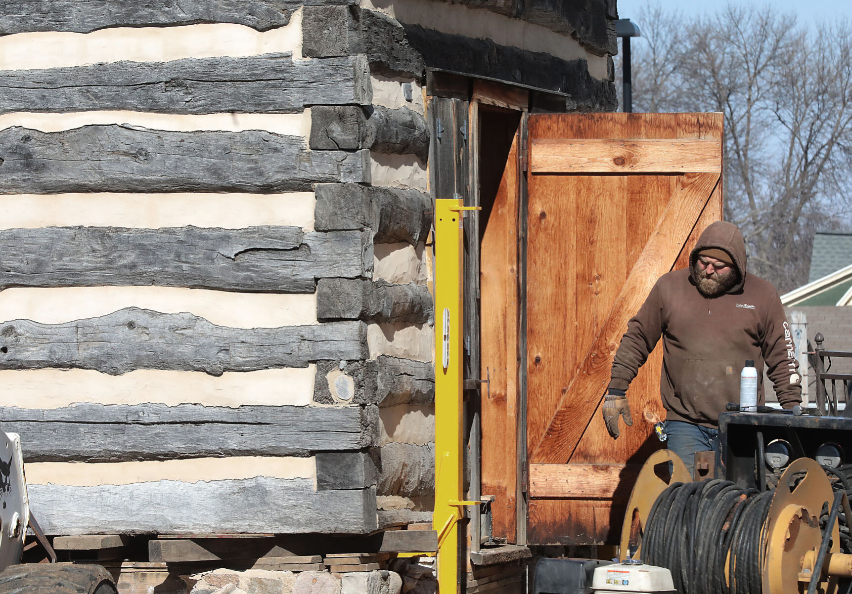 Log cabin readied for temporary move